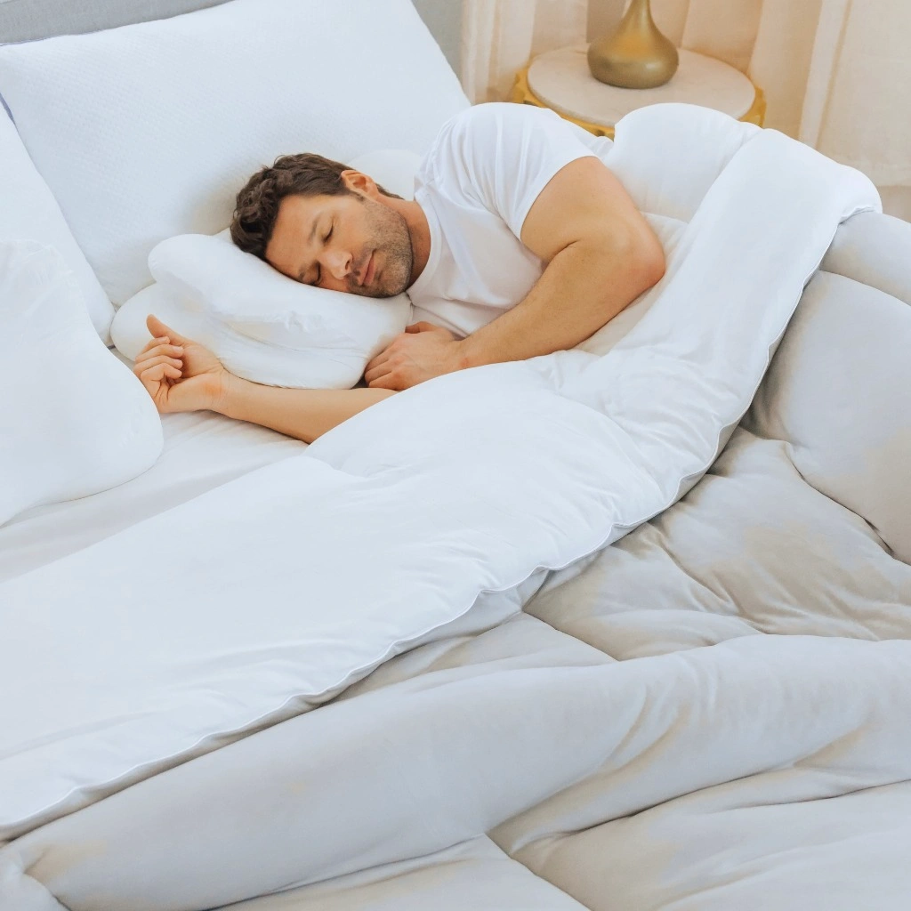 Side sleeper resting with the OrthoAlign contour beneath his neck